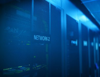 A modern server room featuring network equipment with blue illumination. Ideal for technology themes.