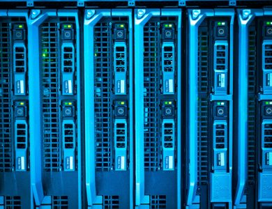 Detailed image of illuminated server racks showcasing modern technology infrastructure.